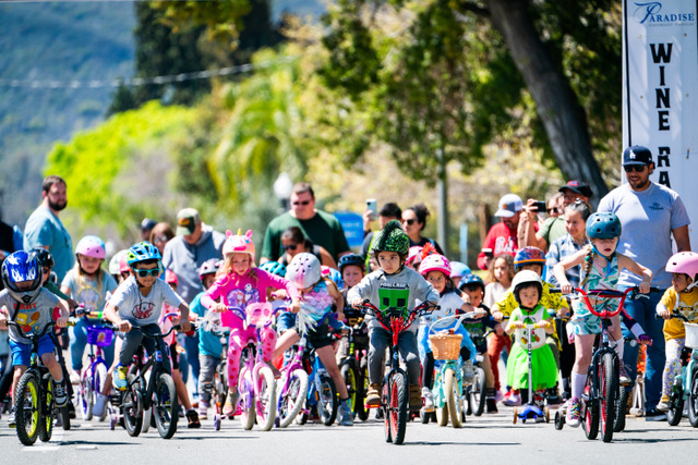 Kids age 2-8, get ready to ride in the Saturday Kids' Bicycle Race. Photo credit: myvalleynews.com (Shane Gibson).